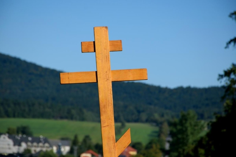 Krzyż, maź i motyl